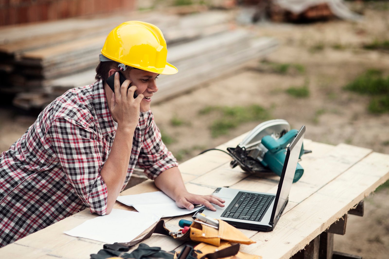 Machinist logging labor and material time against a job in a cost tracking software